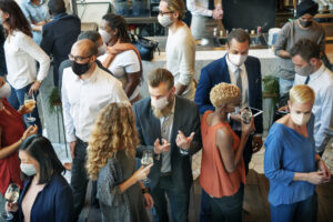 Diverse startup business people with masks in the new normal